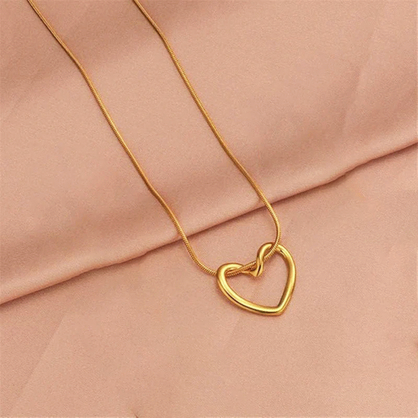 Golden Hollow Heart Pendant Necklace – Minimalist Jewelry